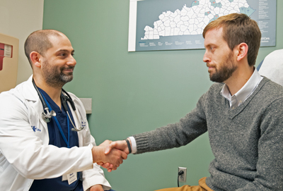 Dr. Andrew Leventhal greets a patient.
