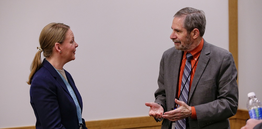 Lowy meets with Jennifer Havens, PhD, to discuss her research related to opioid use and cancer.