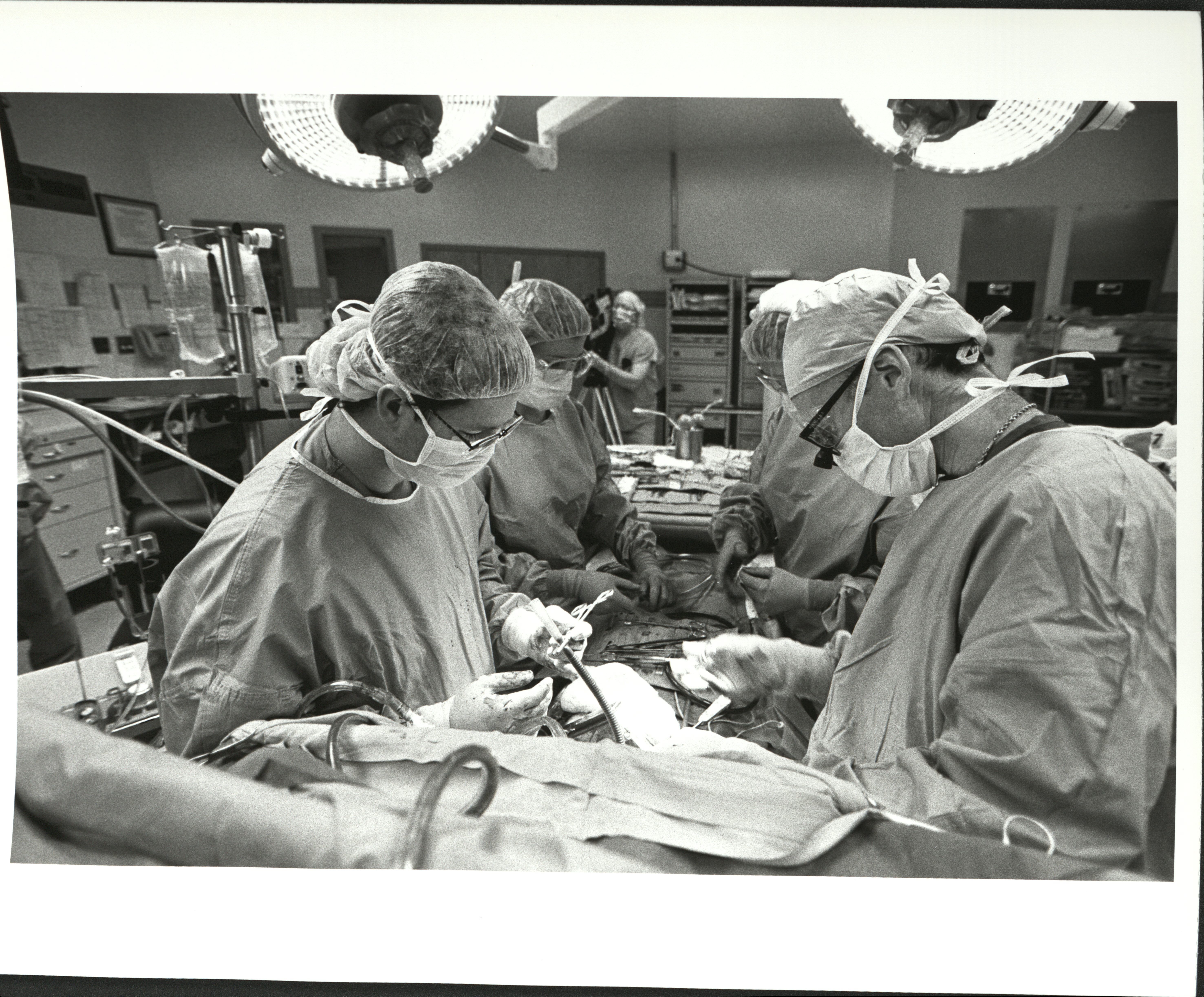 Surgeons conducting an organ transplant.