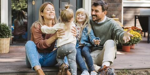 Family together on front step