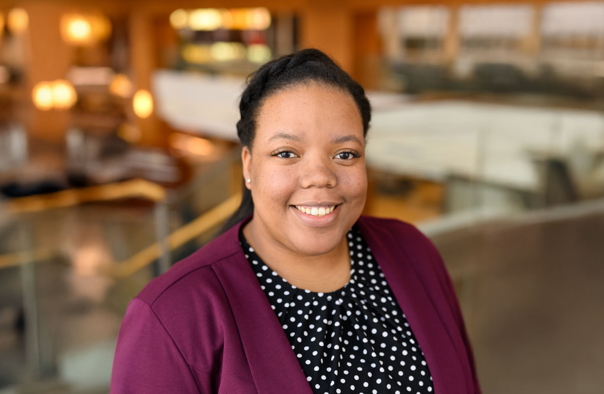 Dr. Tanesha Johnson standing on the second floor of a building