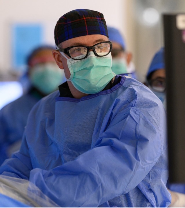 Dr. Fraser performing surgery 