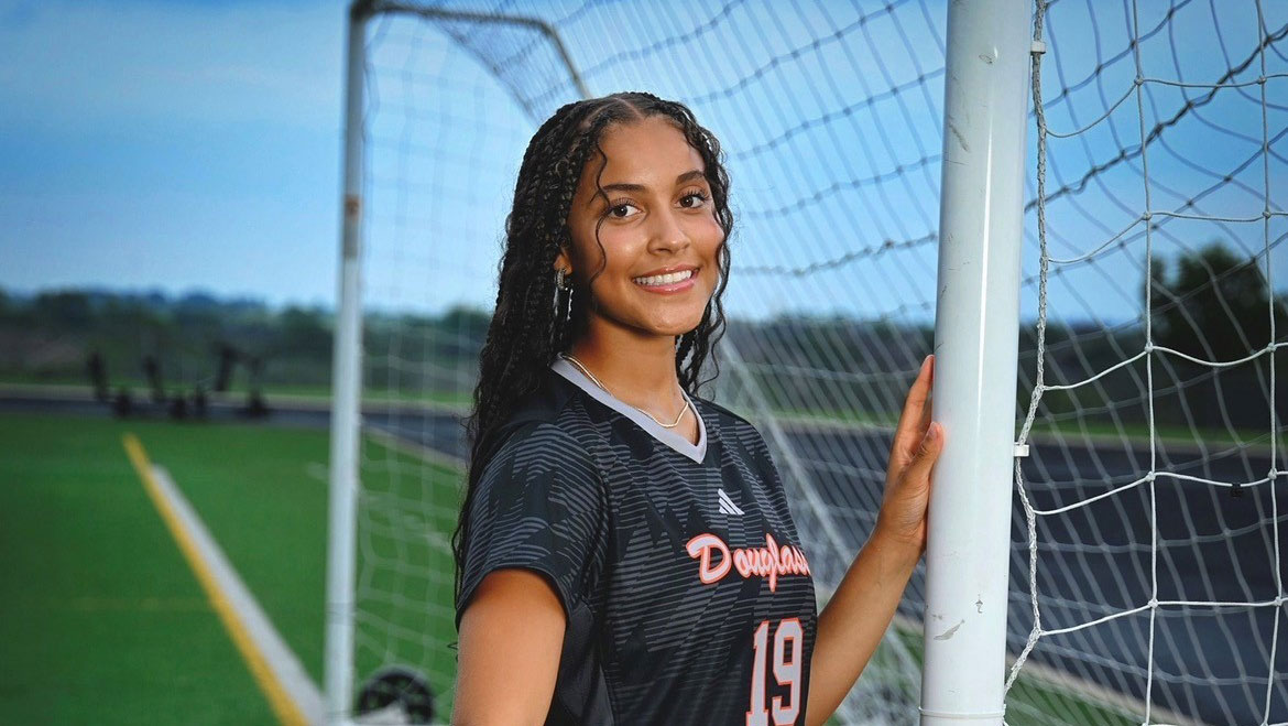 2026 Female Comeback Athlete of the Year Laila Hudspeth poses next to a soccer goal.