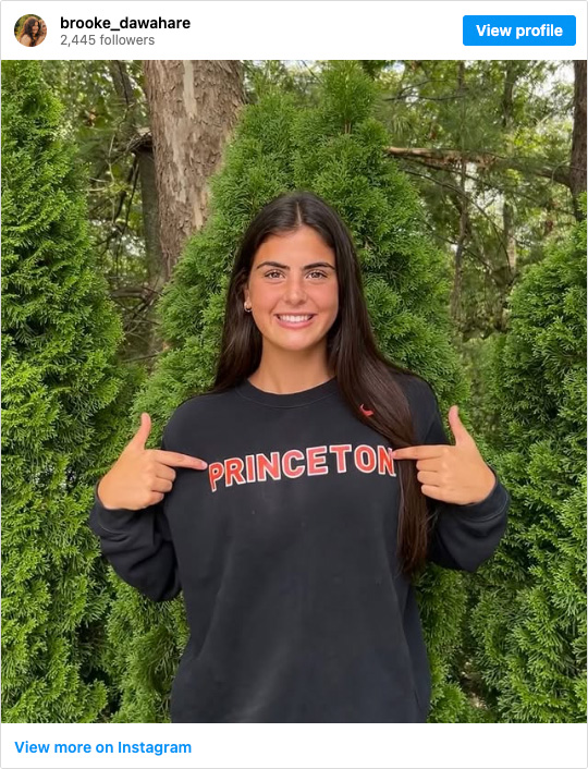 A screenshot of Brooke Dawahare's instagram post, showing her wearing a Princeton shirt