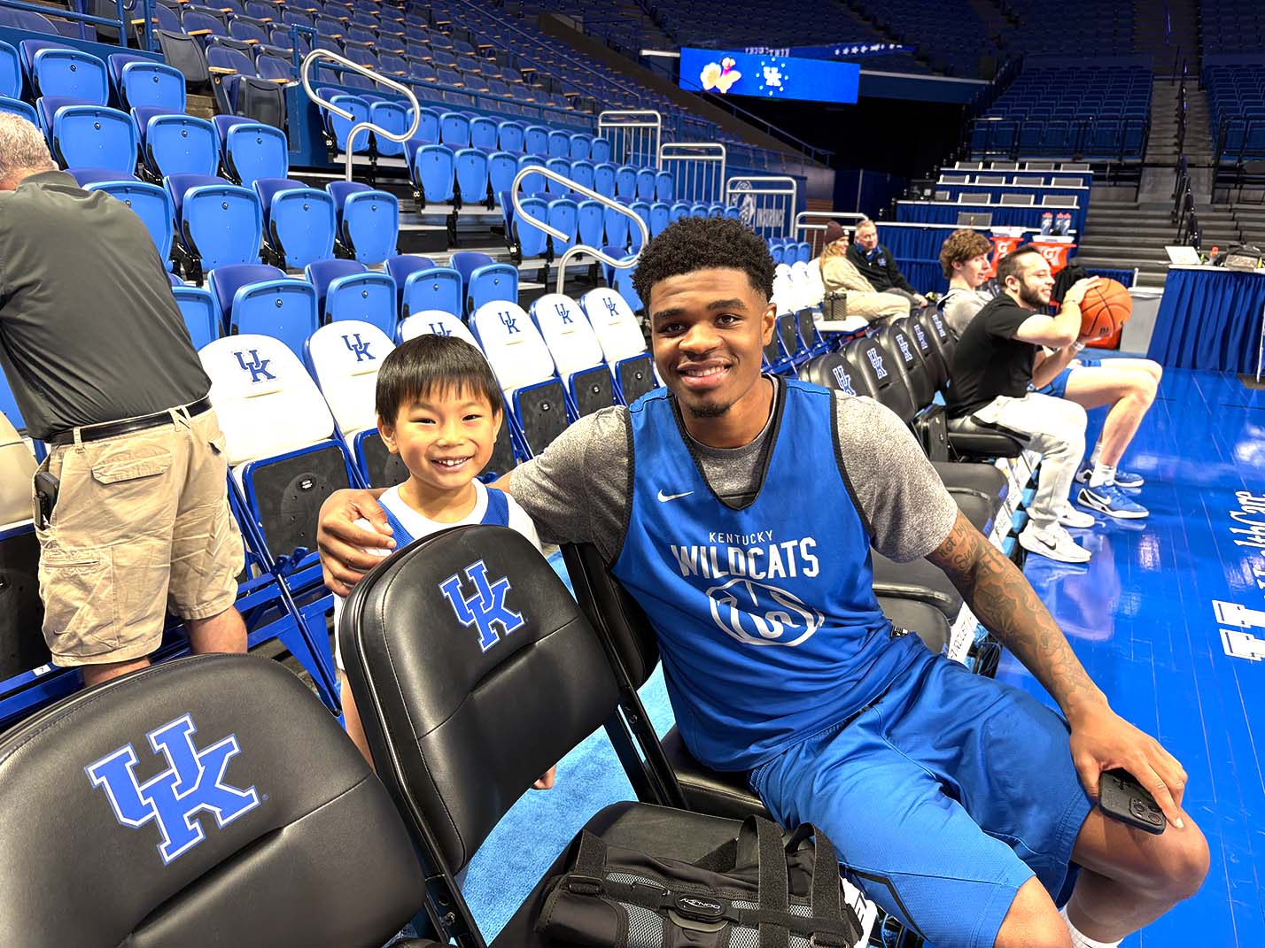 Noah West with UK Basketball player Otega Oweh in Rupp Arena