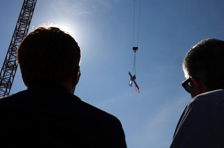 The raising of the signed beam at the Cancer and Advanced Ambulatory Building on July 16.