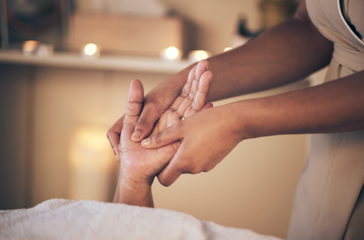 A massage provider gives their client a massage.