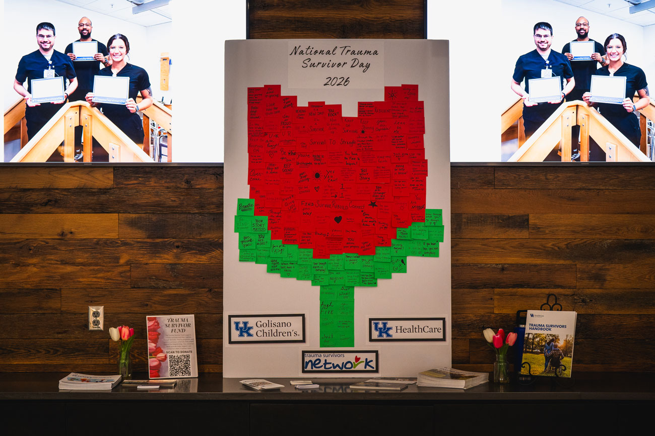 A poster made up of sticky notes arranged to form a red rose in honor of National Trauma Survivors Day 2026