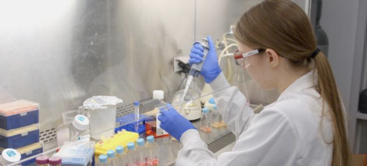 Kristin O'Leary, a participant in the ACTION program, studying acute lymphoblastic leukemia in the lab.
