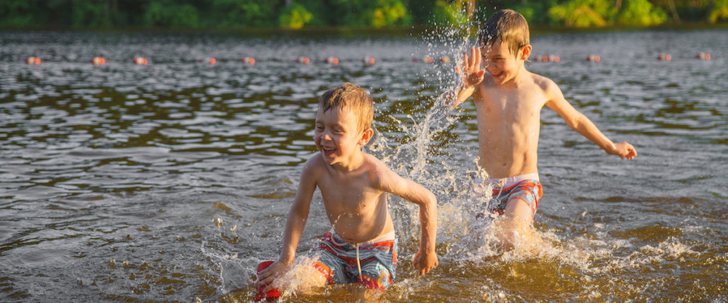 Two boys playing in the water