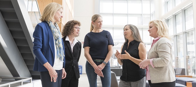 From left to right: Markey Women Strong member Katie Alford; MWS Distinguished Researcher Rina Plattner, PhD; MWS member Josefine Young; MWS Distinguished Researcher Kathleen O’Connor, PhD; and MWS founder Lois Reynolds discuss the work being done by women researchers at the UK Markey Cancer Center.