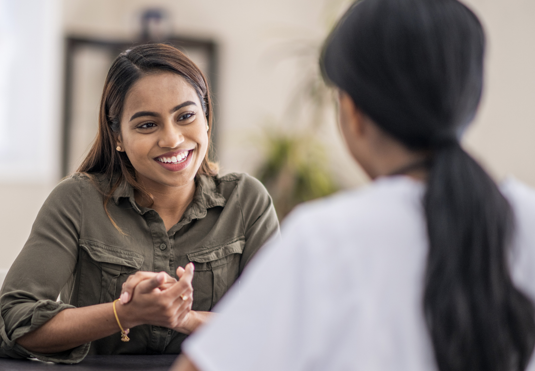 Woman talking to pharmacist