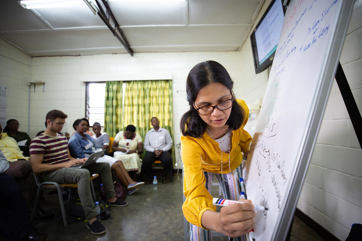 Dr. Asha Shenoi teaches a class in Rwanda.