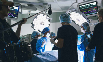 A video shoot for UK HealthCare's brand campaign recreates an operating room setting.