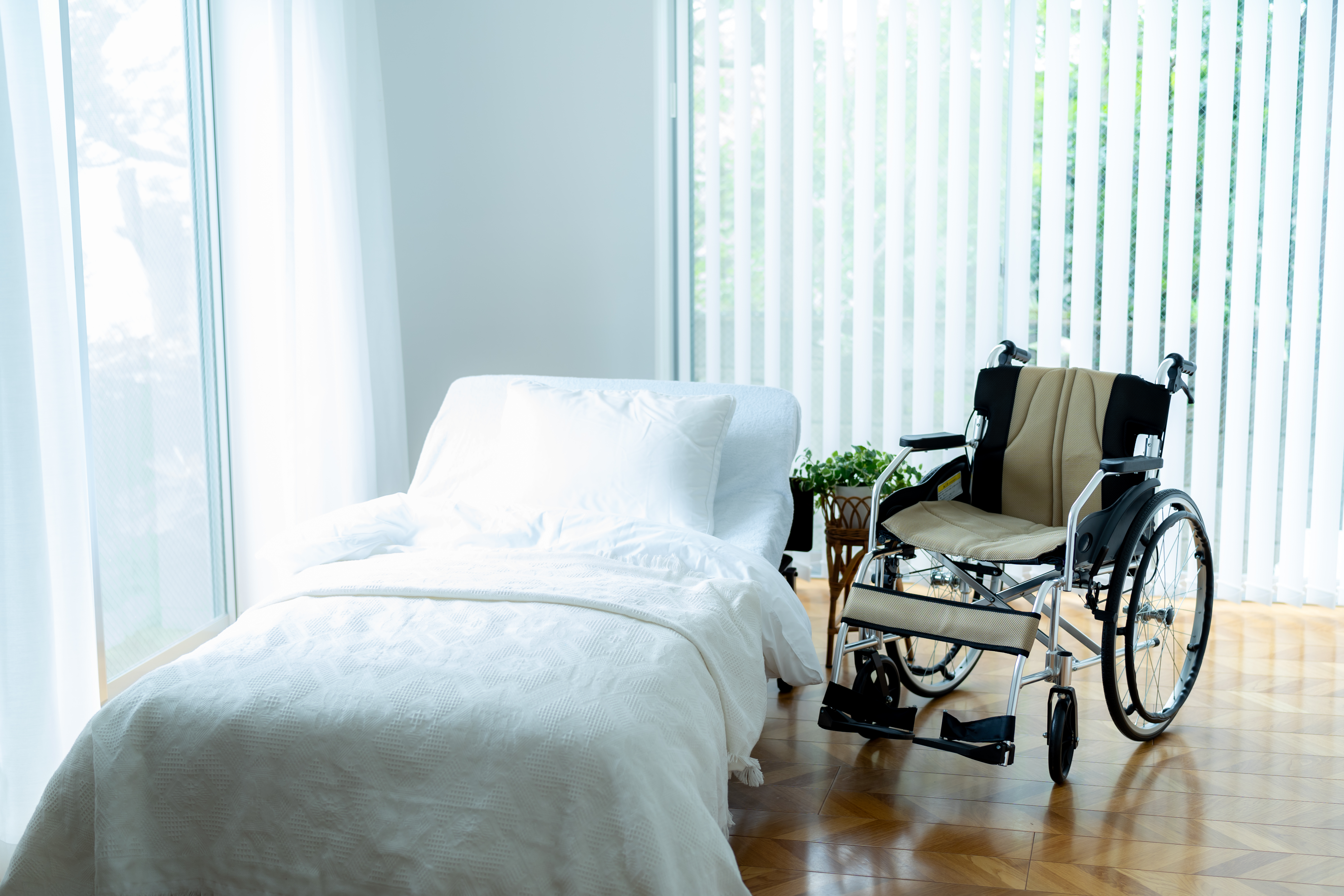 A bed and wheelchair.