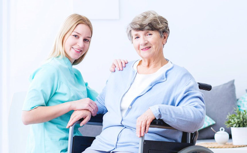 A senior woman with her caregiver.