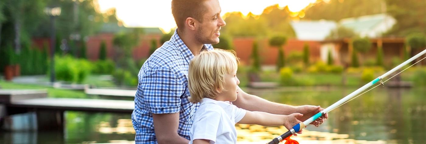 Man and boy fishing together.