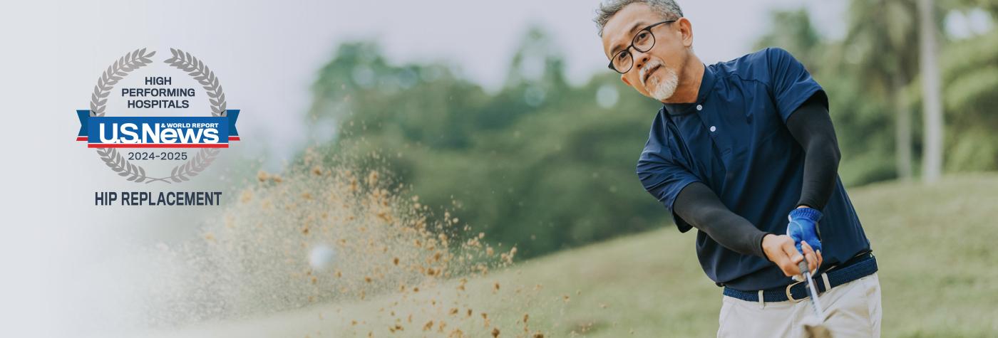 A man hits a golf ball out of a sandtrap. Superimposed on the photo is a badge that reads: U.S. News & World Report 2024-2025 High Performing Hospitals, Hip Replacement.