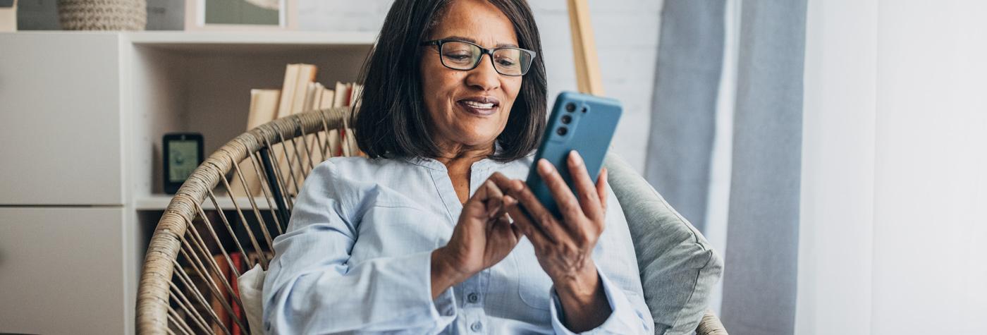 A woman uses her smartphone. 