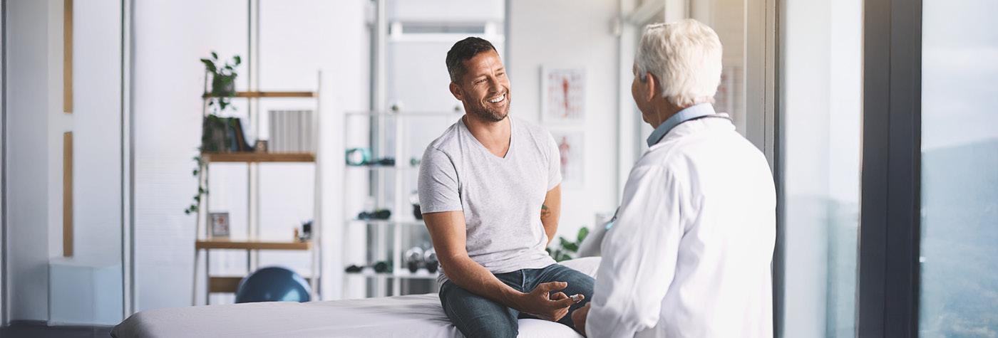 A man talks to his doctor. 