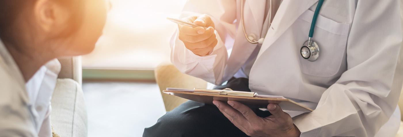 Doctor having a discussion with his patient