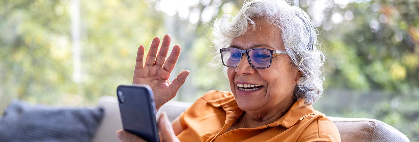 Patient in telehealth call on her phone