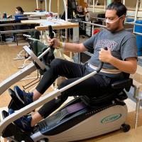 Adiel Nájera participates in a physical therapy session as part of his stroke recovery process.
