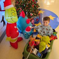 Crew Stone in a wagon during Christmas at Kentucky Children's Hospital