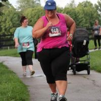Jeanne Hartman, prior to her weight loss surgery, running in an event.