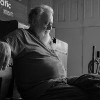 Black and white photo of Shorty Carson in his garage