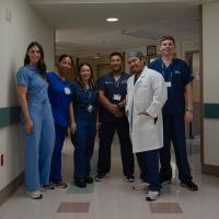 L-R: Holly Schaefer, a rep from Pulmonx; Jasmine Meads, a nurse navigator; Dr. Brenda Garcia; Dr. Ashish Maskey; Dr. Scott Yee; and Matthew McCoy, APRN; they're standing in a hallway for a portrait