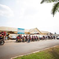 The hospital in Kigali, Rwanda where Dr. Shenoi provided training, with tons of scooters and motorcycles out front.