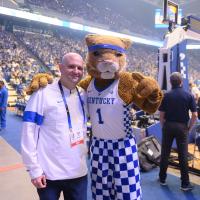 Dr. Adkin stops for a photo with the wildcat mascot.