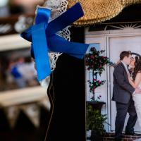 Close up of a framed wedding photograph of Caleb and Amelia kissing.
