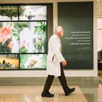Dr. Ed Kasarskis walking in the Kentucky Neuroscience Institute