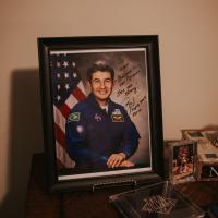 A signed and framed image from NASA of Astronaut Marcos Pontes to Evan.