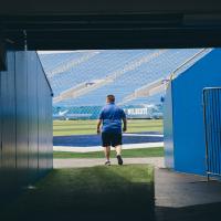 Jimmy walks out on to the UK Football field.