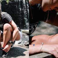 Mac crouches down on a rock, wearing shorts and a black Kentucky Gymnastics shirt. We can see a long scar just below her left knee. Next to that photo, there is another photo of Mac Stretching her leg straight out and bending over it.