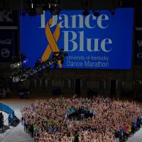 An aerial shot of DanceBlue volunteers waving for the camera.