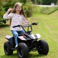 Taytum sits on a tiny ATV. She’s wearing a floral top and jeans and her waist-length hair is loose. She’s smiling, her tongue is out, and she’s flipping a peace sign to the camera.