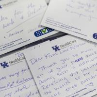 A table of thank-you notes from a grateful community of vaccinated people.