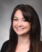 Laura E. Travis, APRN