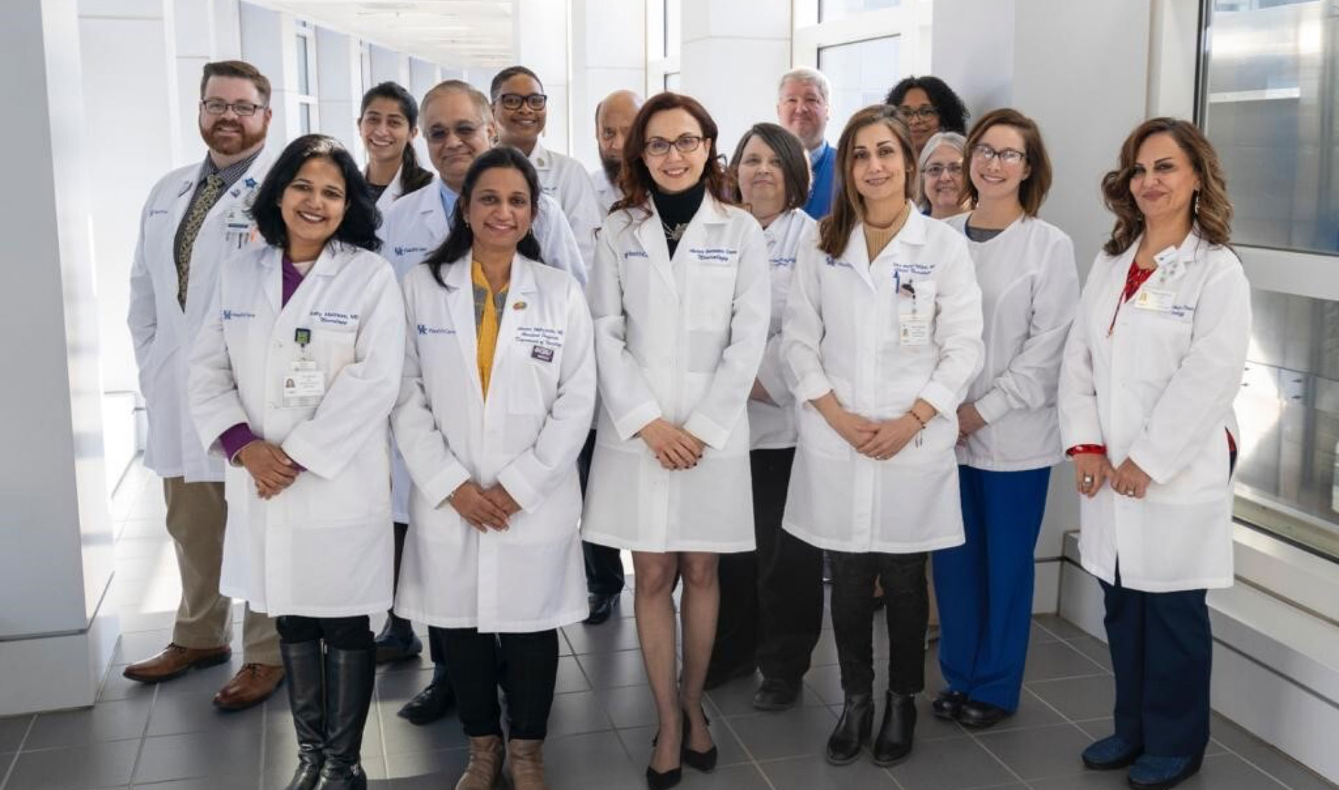 Dr. Siddharth Kapoor and his team at UK HealthCare’s Neuroscience Institute posing for a group photo in the hospital.