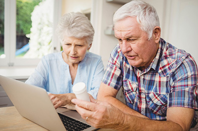 Couple researching prescription