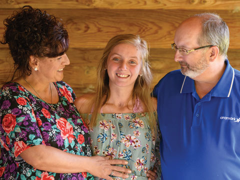 Breanna Jessie with her parents, Debra and Dave