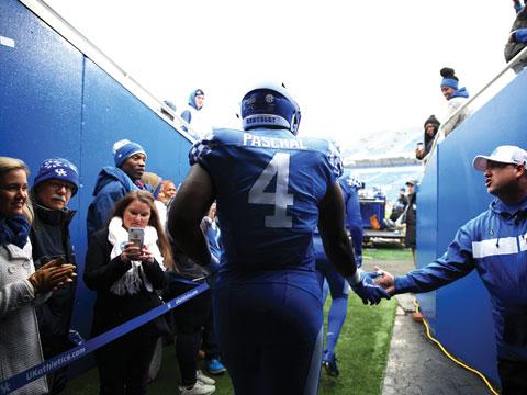 Josh Paschal enters the football field. Josh Paschal enters the football field.