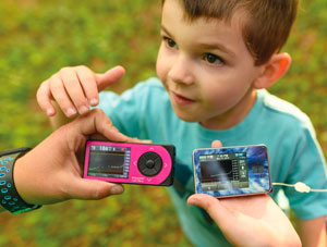 Max Middleton with his glucose meter and insulin pump.