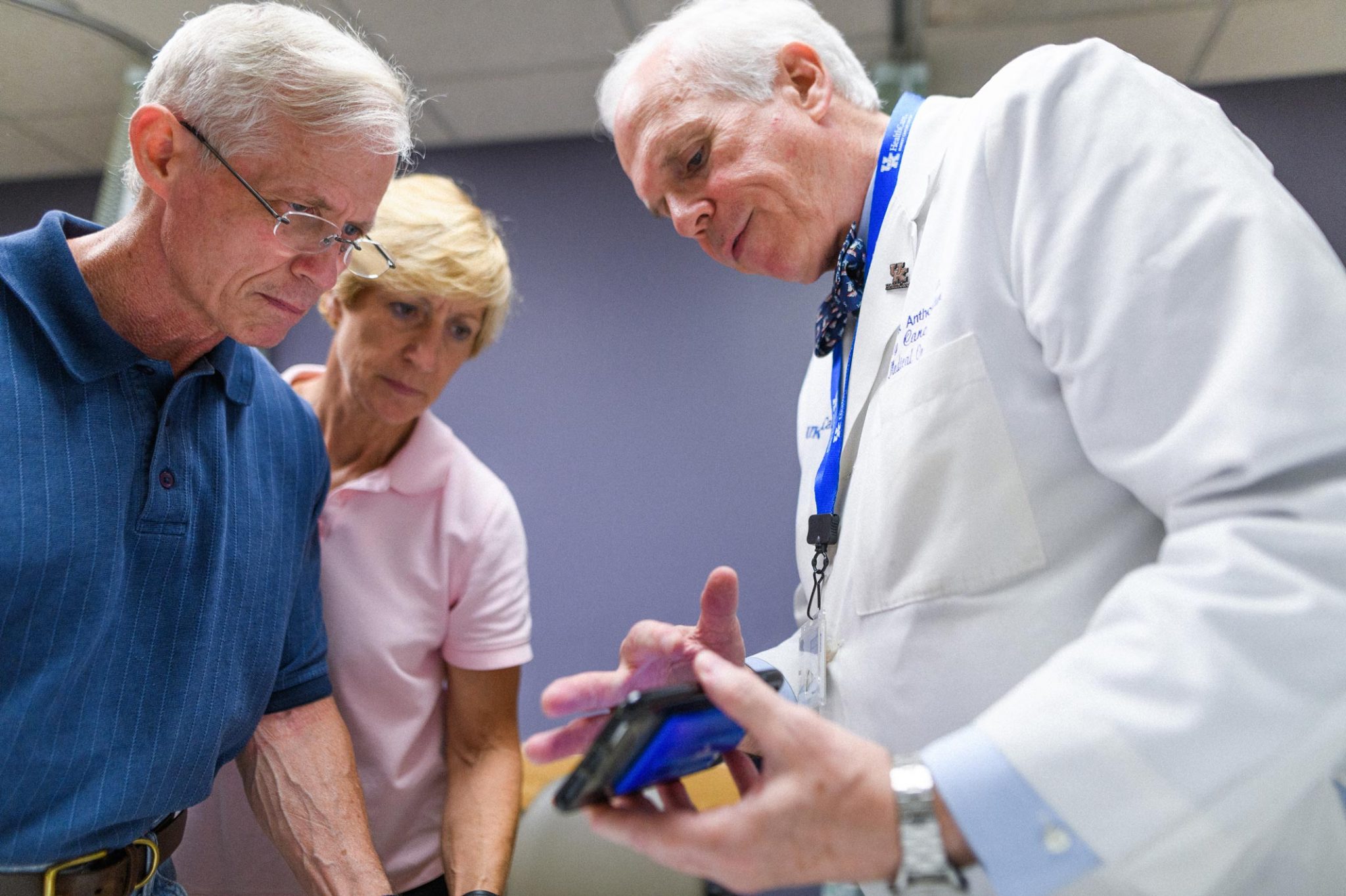 Dr. Lowell Anthony, a specialist at Markey, explains a recent scan to Joe and Cathy.