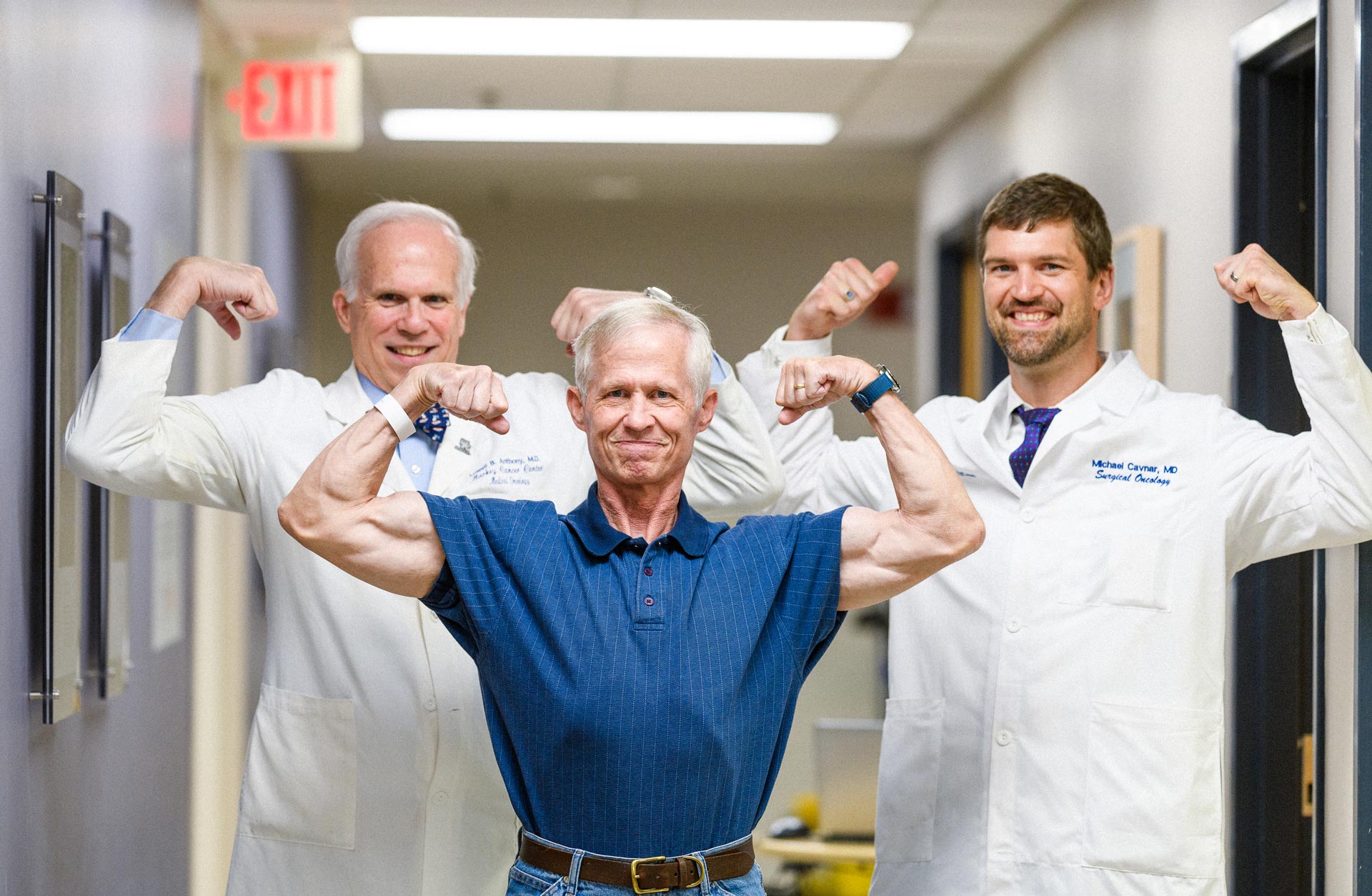 Joe Marksteiner posing with Dr. Michael Cavnar and Dr. Lowell Anthony