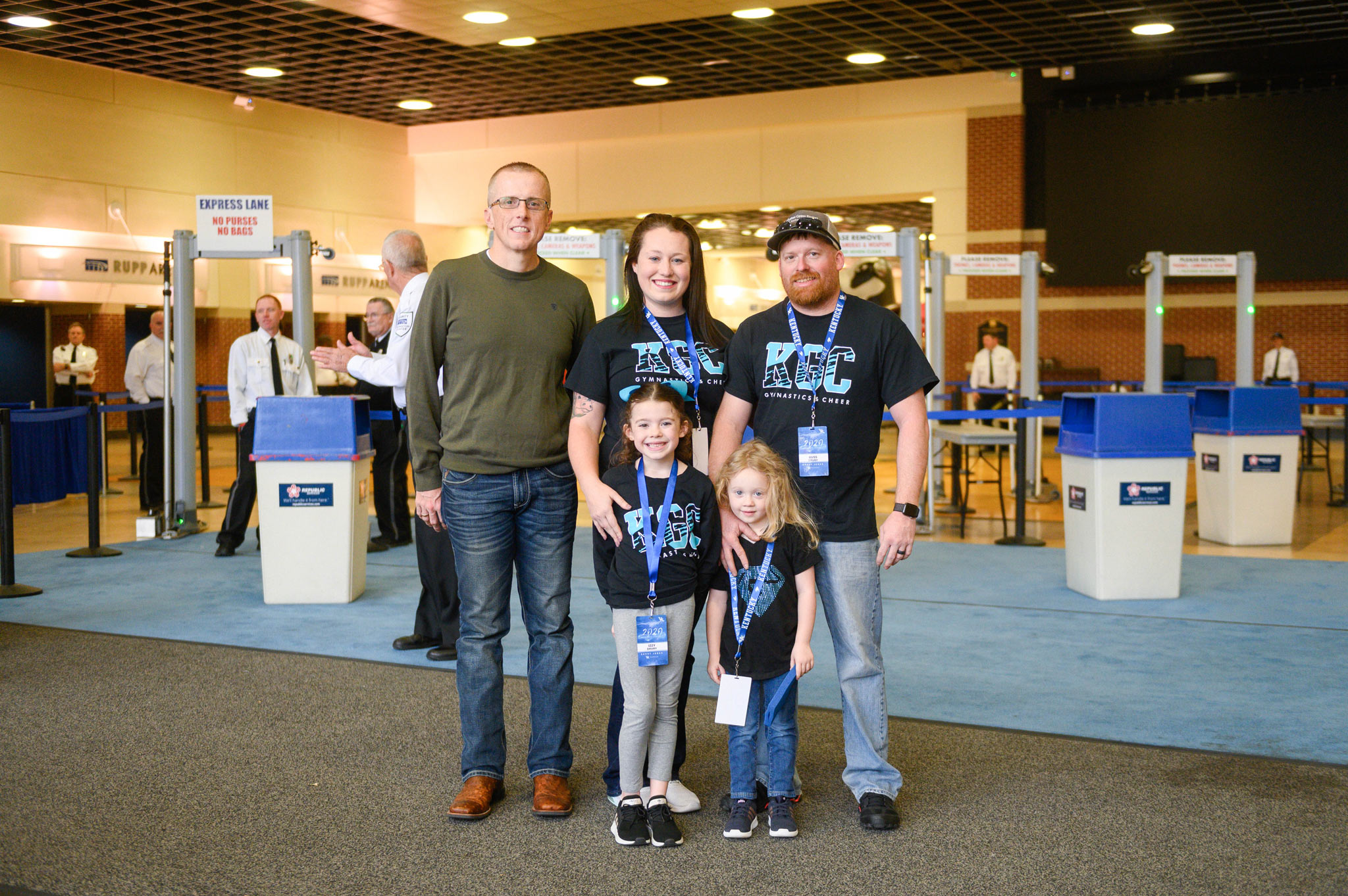 Izzy and her family pose for a photo before entering Rupp Arena for Excite Night.